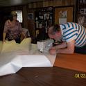 Here I'm sewing a series of reef patches.  It's whole lot easier when you have a second set of hands.